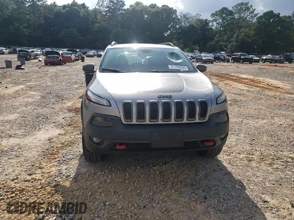 2016 Jeep Cherokee Trailhawk z VIN 1C4PJMBSXGW121272, wystawiony jako Copart lot #61769505 z przebiegiem 119 353 mil mil oraz Szkoda całkowita • Salvage title. Historia ofert i sprzedaży dostępna na DreamBid. Obrazek 14.