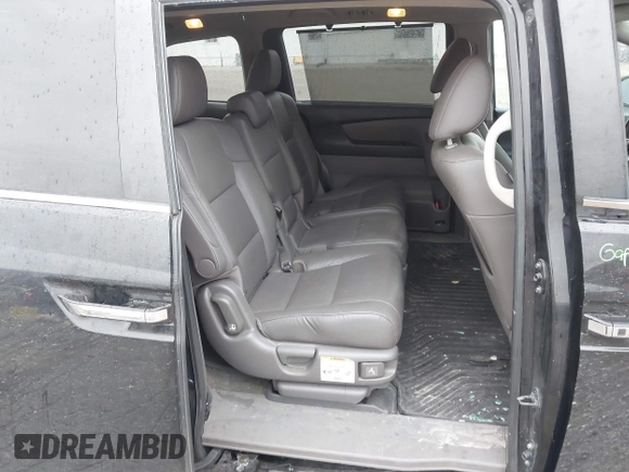 2017 Honda Odyssey EX-L with VIN 5FNRL5H68HB026010, listed as a IAAI auction lot 41884999 with 138,943 mi miles and . Bid and sale history available at DreamBid. Image 8.