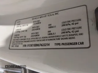 2020 Tesla Model 3 Long Range z VIN 5YJ3E1EB9LF622214, wystawiony jako IAAI lot #41351132 z przebiegiem 133 805 mil mil oraz . Historia ofert i sprzedaży dostępna na DreamBid. Obrazek 9.