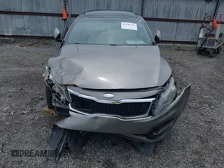 2013 Kia Optima EX z VIN 5XXGN4A78DG196728, wystawiony jako IAAI lot #42242303 z przebiegiem 164 448 mil mil oraz . Historia ofert i sprzedaży dostępna na DreamBid. Obrazek 6.