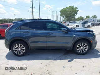 2019 Cadillac XT4 FWD Sport with VIN 1GYFZER42KF107032, listed as a IAAI auction lot 42193557 with 96,615 mi miles and . Bid and sale history available at DreamBid. Image 13.