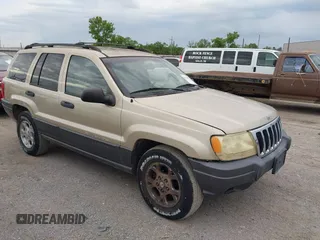 2001 Jeep Grand Cherokee Laredo z VIN 1J4GW48S51C566319, wystawiony jako IAAI lot #42184875 z przebiegiem 148 471 mil mil oraz . Historia ofert i sprzedaży dostępna na DreamBid. Obrazek 1.
