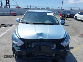 2012 Hyundai Accent GLS z VIN KMHCU4AE1CU057299, wystawiony jako IAAI lot #42130443 z przebiegiem 65 901 mil mil oraz . Historia ofert i sprzedaży dostępna na DreamBid. Obrazek 13.