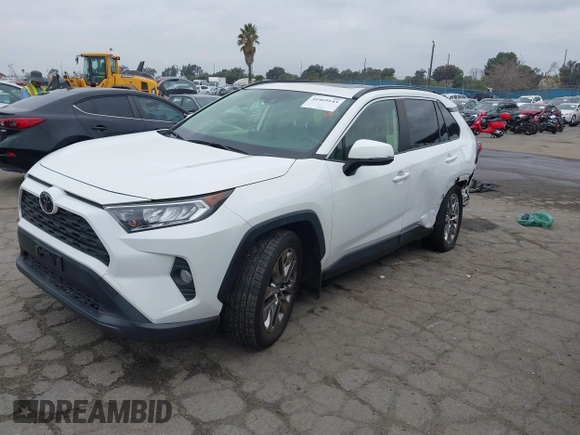 2019 Toyota RAV4 XLE Premium with VIN JTMA1RFV9KD513395, listed as a IAAI auction lot 41469143 with 28,406 mi miles. Bid and sale history available at carsss.com. Image 23.