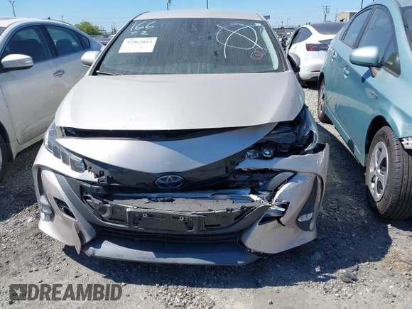 2021 Toyota Prius LE with VIN JTDKAMFP5M3167430, listed as a IAAI auction lot 42462853 with 70,492 mi miles and . Bid and sale history available at DreamBid. Image 13.