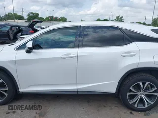 2016 Lexus RX 350 z VIN 2T2ZZMCAXGC001550, wystawiony jako IAAI lot #42083488 z przebiegiem 93 377 mil mil oraz . Historia ofert i sprzedaży dostępna na DreamBid. Obrazek 14.