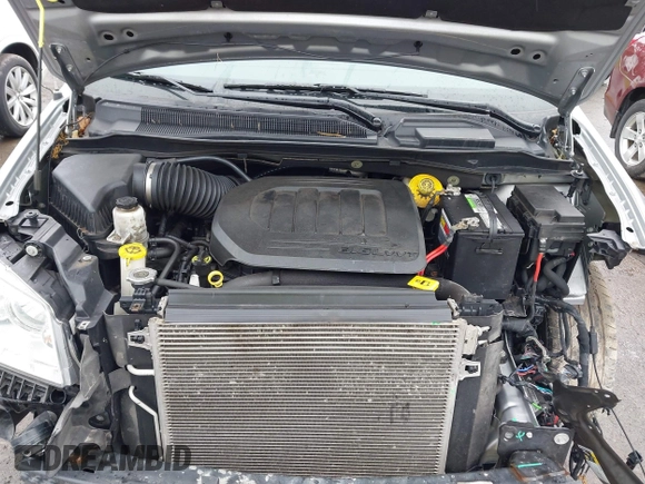 2019 Dodge Grand Caravan SXT with VIN 2C4RDGCG1KR580039, listed as a IAAI auction lot 41997472 with 163,915 mi miles and . Bid and sale history available at DreamBid. Image 10.