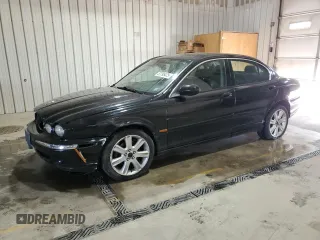 2003 Jaguar X-Type 3.0L z VIN SAJEA51C33WD25630, wystawiony jako Copart lot #57795475 z przebiegiem 135 514 mil mil oraz Szkody całkowita. Historia ofert i sprzedaży dostępna na DreamBid. Obrazek 1.