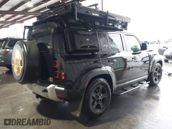 2023 Land Rover Defender S with VIN SALEJ7EX6P2137517, listed as a IAAI auction lot 41502561 with 13,998 mi miles and . Bid and sale history available at DreamBid. Image 4.