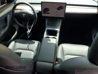 2024 Tesla Model Y Long Range with VIN 7SAYGDEE3RA253354, listed as a Copart auction lot 50524105 with 10,353 mi miles and Salvage Title. Bid and sale history available at DreamBid. Image 8.