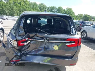 2022 Honda Odyssey Touring with VIN 5FNRL6H89NB008814, listed as a IAAI auction lot 42597738 with 49,933 mi miles and . Bid and sale history available at DreamBid. Image 6.