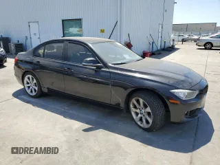 2013 BMW 3 Series 335i xDrive with VIN WBA3B9C51DF587019, listed as a Copart auction lot 59373025 with 118,723 mi miles and Salvage title. Bid and sale history available at DreamBid. Image 4.