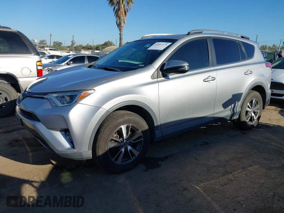 2018 Toyota RAV4 XLE with VIN 2T3WFREV8JW474230, listed as a IAAI auction lot 42687475 with 182,264 mi miles and . Bid and sale history available at DreamBid. Image 2.