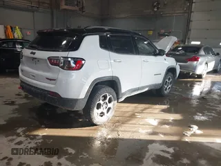 2022 Jeep Compass Trailhawk with VIN 3C4NJDDB8NT199704, listed as a IAAI auction lot 41611028 with 27,247 mi miles and . Bid and sale history available at DreamBid. Image 4.
