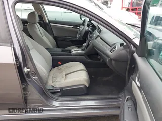 2017 Honda Civic LX z VIN 19XFC2F53HE023730, wystawiony jako IAAI lot #41885003 z przebiegiem 129 595 mil mil oraz . Historia ofert i sprzedaży dostępna na DreamBid. Obrazek 5.