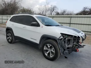 2014 Jeep Cherokee Trailhawk with VIN 1C4PJMBS3EW294676, listed as a Copart auction lot 47652335 with 161,663 mi miles and Salvage Title. Bid and sale history available at carsss.com. Image 4.