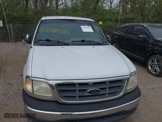 2001 Ford F-150 SuperCrew XLT with VIN 1FTRW07LX1KA24415, listed as a IAAI auction lot 42081030 with 298,673 mi miles. Bid and sale history available at carsss.com. Image 6.