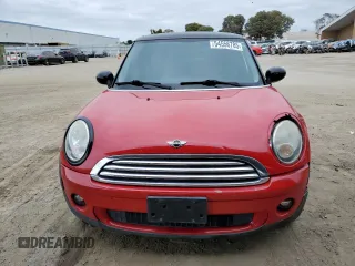 2009 MINI Hardtop with VIN WMWMF33519TW77558, listed as a Copart auction lot 54556785 with 97,749 mi miles and Salvage Title. Bid and sale history available at DreamBid. Image 5.