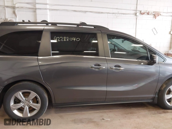 2018 Honda Odyssey EX-L z VIN 5FNRL6H79JB013982, wystawiony jako IAAI lot #42288040 z przebiegiem 82 416 mil mil oraz . Historia ofert i sprzedaży dostępna na DreamBid. Obrazek 13.