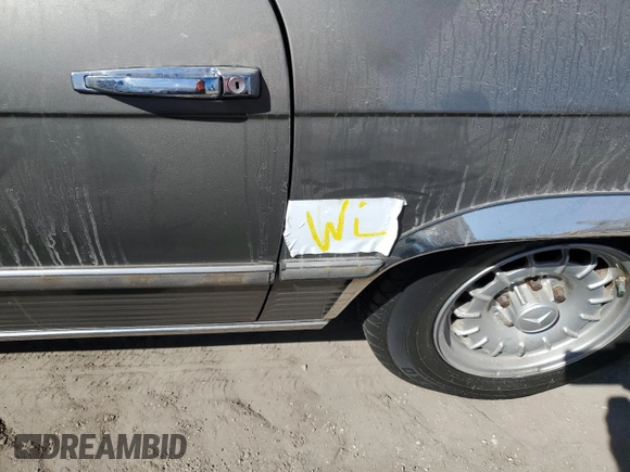 1979 Mercedes-Benz SL with VIN 10704412056845, listed as a Copart auction lot 74874294 with 148,200 mi miles and Salvage title. Bid and sale history available at DreamBid. Image 12.