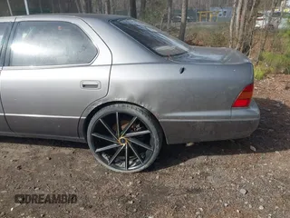 1995 Lexus LS 400 z VIN JT8UF22E9S0018339, wystawiony jako IAAI lot #41848747 z przebiegiem Nie podano mil oraz . Historia ofert i sprzedaży dostępna na DreamBid. Obrazek 6.