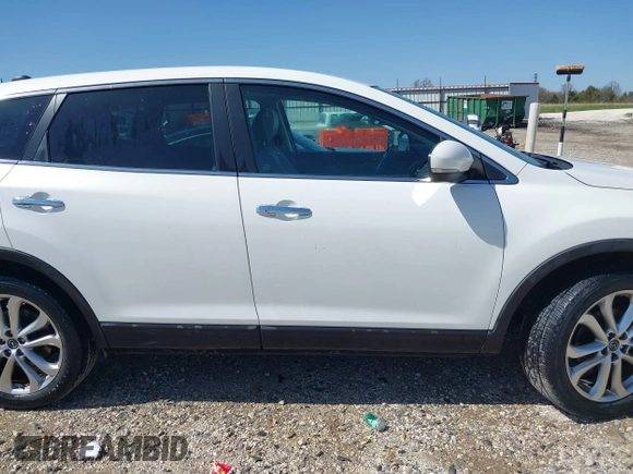 2013 Mazda CX-9 Grand Touring with VIN JM3TB2DA3D0403697, listed as a IAAI auction lot 41976262 with 127,117 mi miles and . Bid and sale history available at DreamBid. Image 14.