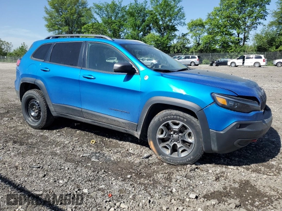 2019 Jeep Cherokee Trailhawk with VIN 1C4PJMBX9KD393862, listed as a Copart auction lot 56695905 with 64,334 mi miles and Salvage title. Bid and sale history available at DreamBid. Image 4.