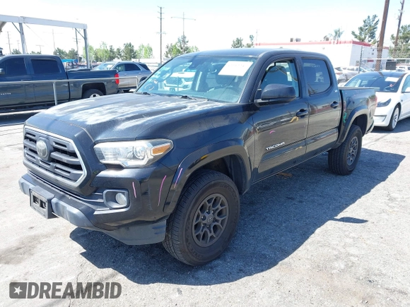 2018 Toyota Tacoma SR5 with VIN 3TMAZ5CN1JM061127, listed as a IAAI auction lot 42012247 with 119,381 mi miles and . Bid and sale history available at DreamBid. Image 17.