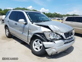2001 Mercedes-Benz M-Class with VIN 4JGAB54E61A279219, listed as a Copart auction lot 37373650 with 213,349 mi miles and Salvage Title. Bid and sale history available at carsss.com. Image 1.