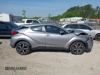 2018 Toyota C-HR XLE with VIN NMTKHMBX1JR026901, listed as a IAAI auction lot 42021943 with 78,217 mi miles and . Bid and sale history available at DreamBid. Image 13.