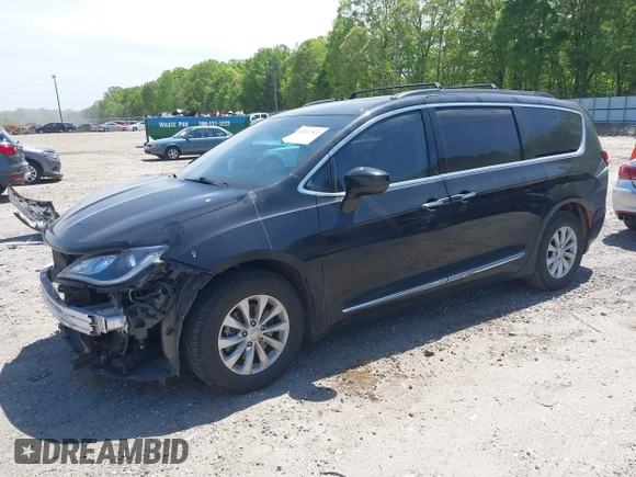2017 Chrysler Pacifica Touring L with VIN 2C4RC1BG7HR539716, listed as a IAAI auction lot 42037822 with 160,623 mi miles and . Bid and sale history available at DreamBid. Image 2.