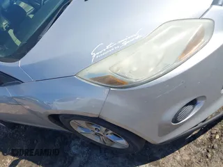 2013 Ford Focus SE with VIN 1FADP3F27DL178733, listed as a IAAI auction lot 41597711 with 206,967 mi miles. Bid and sale history available at carsss.com. Image 12.