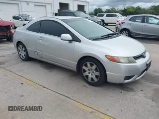 2006 Honda Civic Cpe LX with VIN 2HGFG12606H568106, listed as a IAAI auction lot 41983712 with 196,957 mi miles. Bid and sale history available at carsss.com. Image 1.