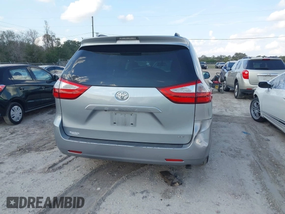 2015 Toyota Sienna LE AAS z VIN 5TDKK3DCXFS653627, wystawiony jako IAAI lot #41477920 z przebiegiem Nie podano mil oraz . Historia ofert i sprzedaży dostępna na DreamBid. Obrazek 17.
