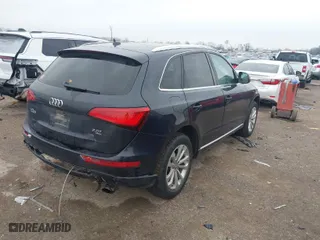 2014 Audi Q5 Premium Plus with VIN WA1LFAFP8EA046046, listed as a IAAI auction lot 41590009 with 128,452 mi miles. Bid and sale history available at carsss.com. Image 4.