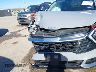 2023 Kia Sportage SX-Prestige z VIN 5XYK53AF8PG108434, wystawiony jako IAAI lot #41412399 z przebiegiem 47 312 mil mil oraz . Historia ofert i sprzedaży dostępna na DreamBid. Obrazek 6.