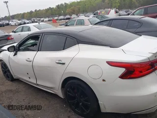 2017 Nissan Maxima Platinum with VIN 1N4AA6AP2HC412534, listed as a IAAI auction lot 41910678 with 140,675 mi miles and . Bid and sale history available at DreamBid. Image 14.