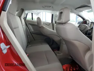 2009 Dodge Caliber SXT z VIN 1B3HB48A29D156808, wystawiony jako Copart lot #52732095 z przebiegiem 99 613 mil mil oraz Szkoda całkowita • Salvage title. Historia ofert i sprzedaży dostępna na DreamBid. Obrazek 11.