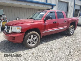 2008 Dodge Dakota Laramie with VIN 1D7HW58N18S517697, listed as a Copart auction lot 61007934 with Not Provided miles and Salvage Title. Bid and sale history available at carsss.com. Image 1.