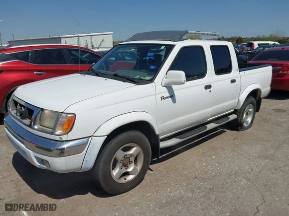2000 Nissan Frontier 2WD XE with VIN 1N6ED27T0YC387758, listed as a IAAI auction lot 41981132 with 247,214 mi miles. Bid and sale history available at carsss.com. Image 2.