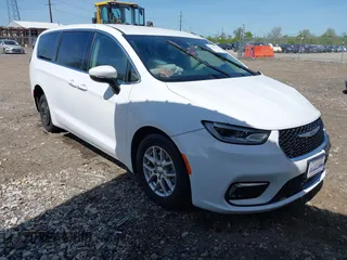 2023 Chrysler Pacifica Touring L with VIN 2C4RC1BG6PR611245, listed as a IAAI auction lot 42156562 with 29,604 mi miles and . Bid and sale history available at DreamBid. Image 1.