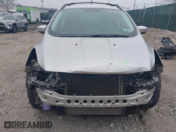 2016 Ford Escape SE with VIN 1FMCU9GX3GUB65337, listed as a IAAI auction lot 41767376 with 99,092 mi miles. Bid and sale history available at carsss.com. Image 12.