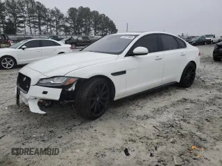2016 Jaguar XF S with VIN SAJBG4BV6GCY17651, listed as a Copart auction lot 82511083 with 117,677 mi miles. Bid and sale history available at carsss.com. Image 1.