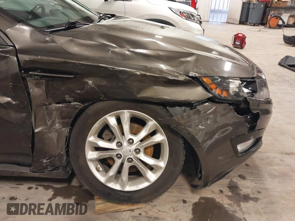 2013 Kia Optima EX with VIN 5XXGN4A72DG120129, listed as a IAAI auction lot 41858461 with 138,627 mi miles. Bid and sale history available at carsss.com. Image 6.