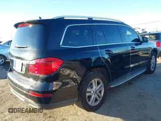 2014 Mercedes-Benz GL-Class GL 450 with VIN 4JGDF7CE3EA405380, listed as a IAAI auction lot 41383386 with 112,024 mi miles. Bid and sale history available at carsss.com. Image 4.