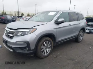 2019 Honda Pilot EX-L with VIN 5FNYF6H54KB055687, listed as a IAAI auction lot 42050539 with 50,989 mi miles and . Bid and sale history available at carsss.com. Image 2.