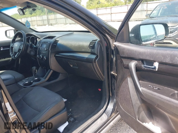 2013 Kia Sorento LX with VIN 5XYKT3A19DG381288, listed as a IAAI auction lot 42797647 with 220,000 mi miles and . Bid and sale history available at DreamBid. Image 5.