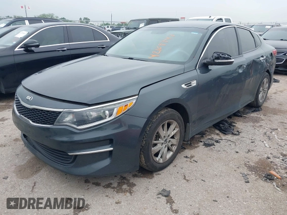 2016 Kia Optima LX z VIN KNAGT4L30G5070000, wystawiony jako IAAI lot #42169747 z przebiegiem 267 498 mil mil oraz . Historia ofert i sprzedaży dostępna na DreamBid. Obrazek 18.