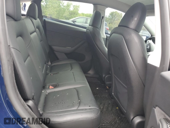 2024 Tesla Model Y Long Range z VIN 7SAYGDEE0RA286070, wystawiony jako Copart lot #58200425 z przebiegiem 16 881 mil mil oraz Szkoda całkowita • Salvage title. Historia ofert i sprzedaży dostępna na DreamBid. Obrazek 11.