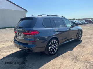 2022 BMW X7 M50i z VIN 5UXCX6C09N9K44917, wystawiony jako Copart lot #54822275 z przebiegiem 123 855 mil mil oraz Tytuł czysty. Historia ofert i sprzedaży dostępna na DreamBid. Obrazek 3.